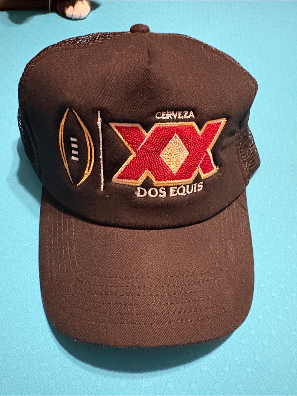 Dos Equis Black Mesh Trucker Hat with Red/Gold XX Logo